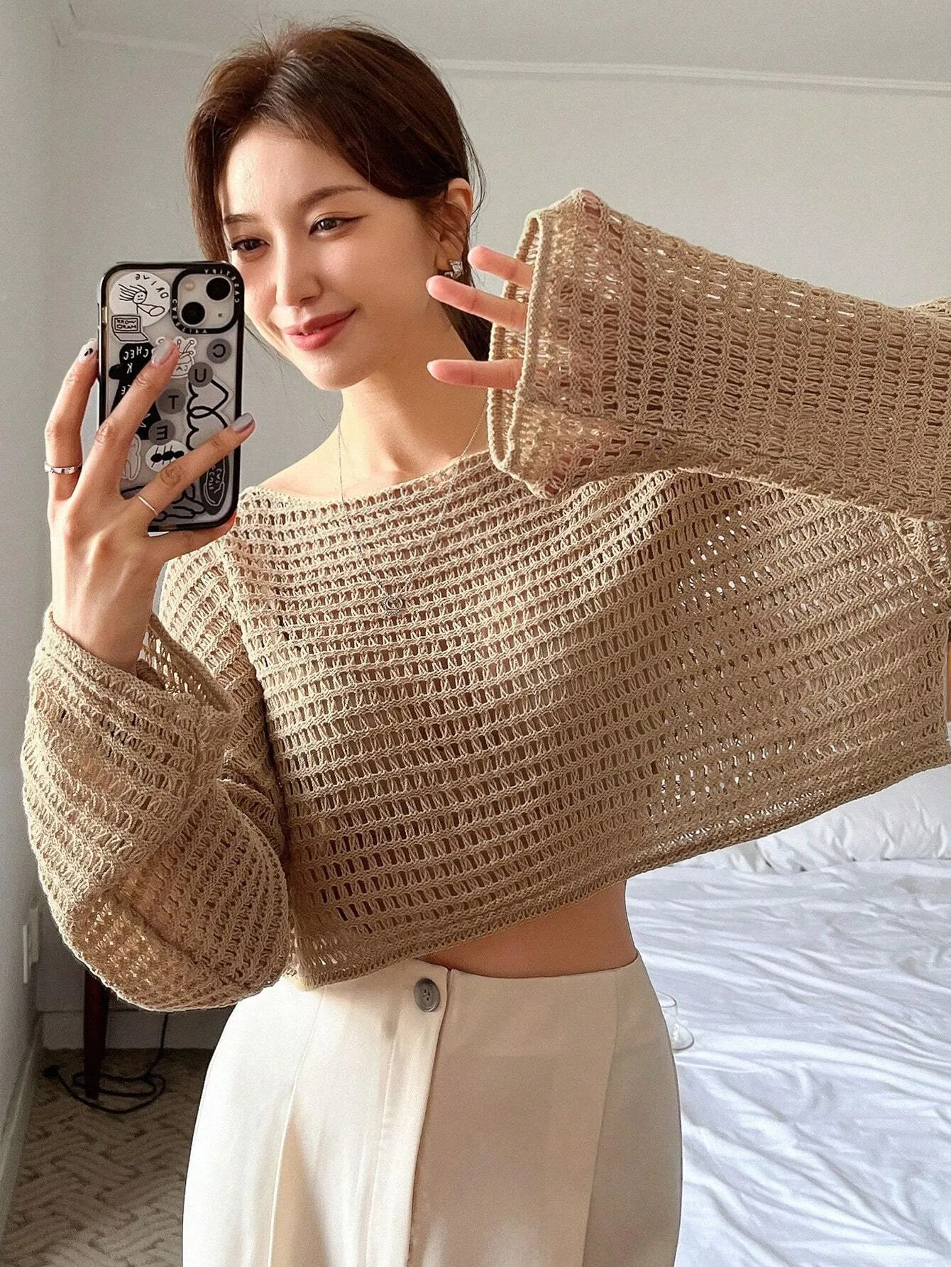 SHEIN DAZY Women Solid Color Basic Round Neck Hollow Knitted Sweater